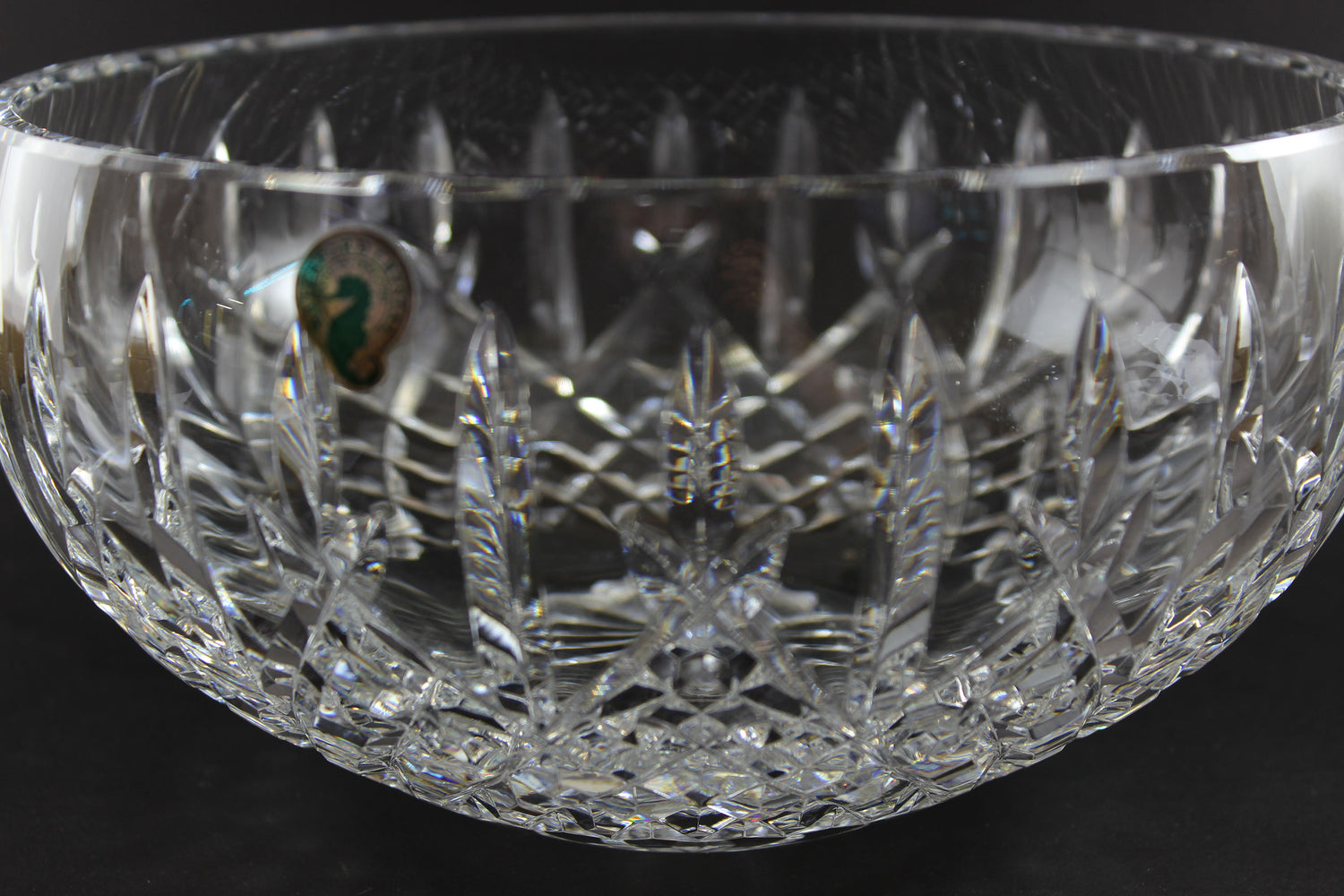 Waterford cut crystal bowl with intricate designs on a black background