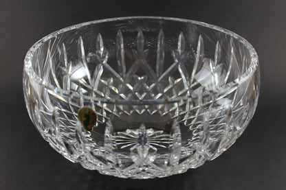 Waterford cut crystal bowl with intricate designs on a black background