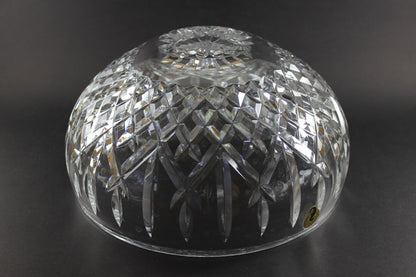 Waterford cut crystal bowl with intricate designs on a black background