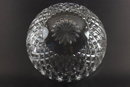 Waterford cut crystal bowl with intricate designs on a black background