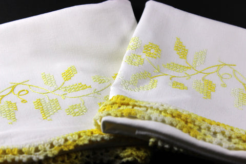 Yellow Cross Stitched and Crochet Edged Pillowcases