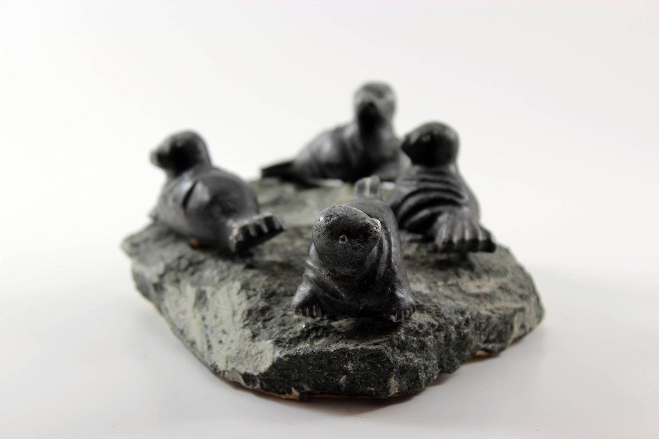 Inuit Soapstone Sculpture-Four Seals on Rock